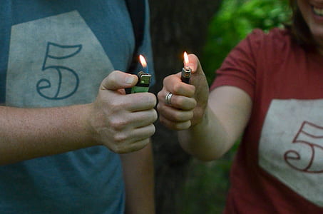 person lighter green disposable lighter thumbnail