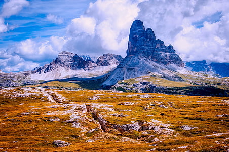 brown plains with high mountains thumbnail