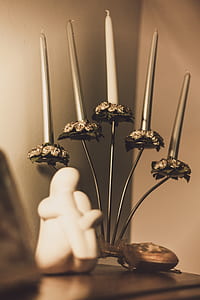 Gray Floral Candelabra on Brown Wooden Surface thumbnail