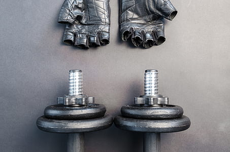 Pair of Fingerless Gloves and Adjustable Dumbbells thumbnail