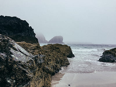 rocks near body of water thumbnail