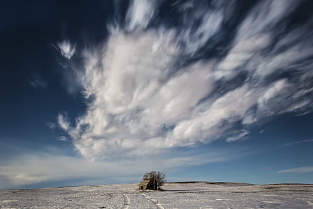 brown house under nimbus cumulus clouds thumbnail