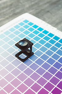 black lens on multicolored table top thumbnail
