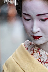 selective focus photography of woman wearing multicolored top thumbnail