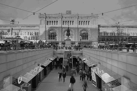 grayscale photography of people near building thumbnail