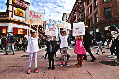 group of girls holding signages thumbnail