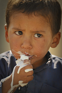 child eating cream thumbnail