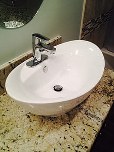 white ceramic sink and faucet thumbnail