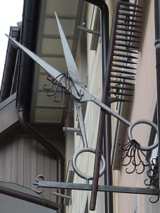 gray metal hanged on metal rack thumbnail