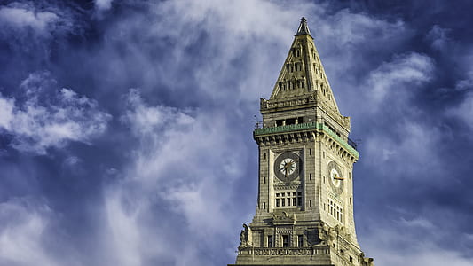 gray clock tower during daytime thumbnail