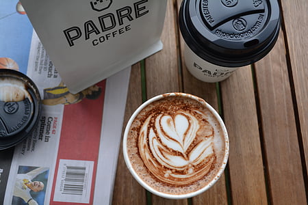 red plastic cup filled with coffee thumbnail