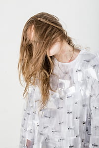 woman wearing gray and white crew-neck top thumbnail