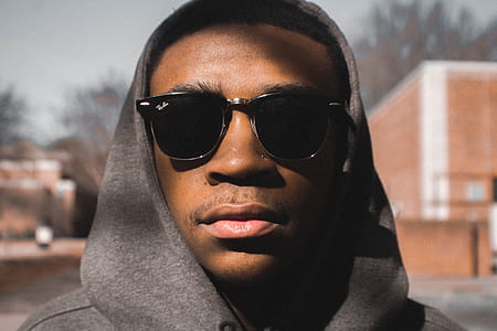 Man Wearing Black Ray-ban Sunglasses thumbnail