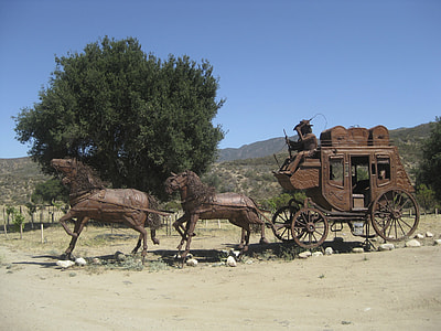 brown horse coach on statue thumbnail