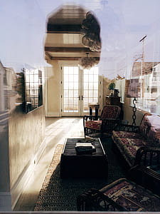 three-piece sofa set seen through clear window thumbnail