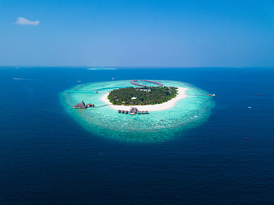 aerial photography of island during daytime thumbnail