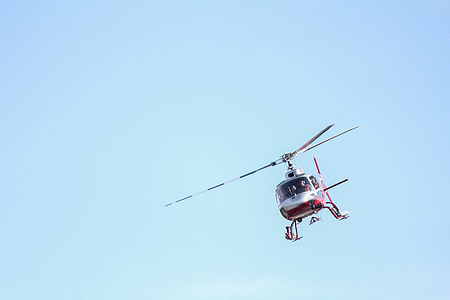 gray helicopter on sky thumbnail