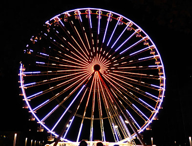 lit red and blue ferris wheel low-angle photography thumbnail