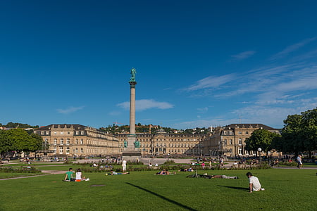 man lying on green grass field during daytime thumbnail