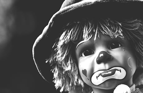 grayscale photo of sad clown thumbnail