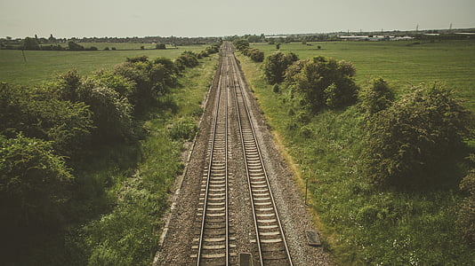 photo of train railings during daytime thumbnail