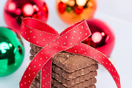 stack of chocolates with red bow on top thumbnail