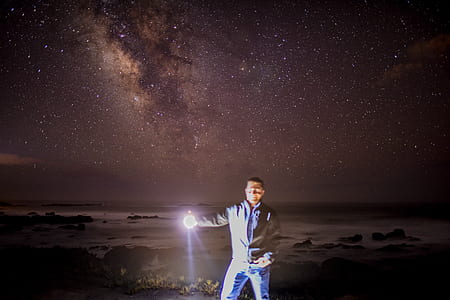 man holding light thumbnail