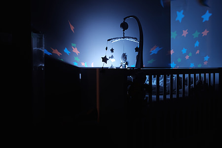 lighted crib mobile in dark room thumbnail