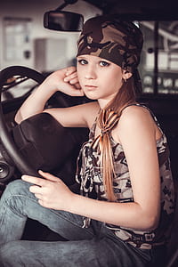 woman sitting inside vehicle thumbnail