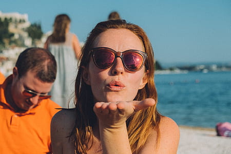selective focus photography of woman face thumbnail