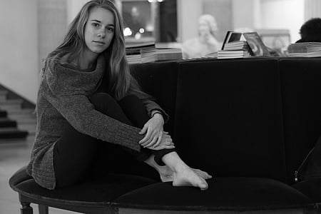 grayscaler photo of woman sitting on bench thumbnail