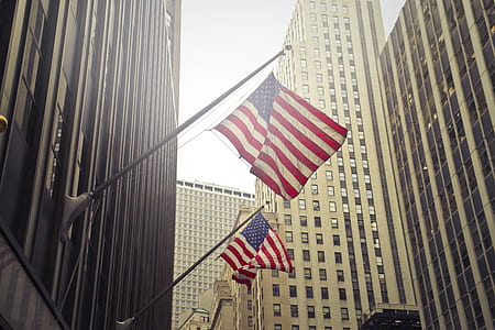 Two U.s.a. Flags Under White Clouds at Daytime thumbnail