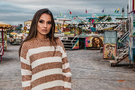 Woman In White And Brown Striped Sweater thumbnail