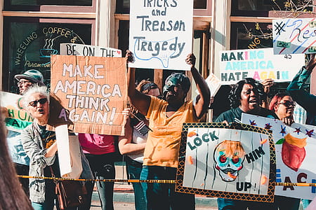 People Rallying in Front of Coffee Shop thumbnail