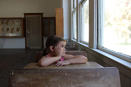 girl resting palm starring outside thumbnail