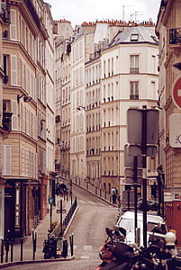 concrete road between buildings thumbnail