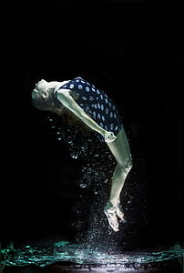 under water photo of woman wearing polka-dot dress thumbnail