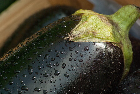 closeup photography of black and green eggplant thumbnail