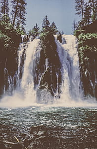 Low angle view of waterfall thumbnail
