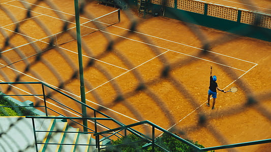 person playing tennis thumbnail