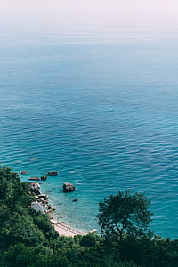 body of water during daytime thumbnail