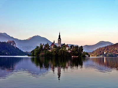 tower surrounded by water during daytime thumbnail