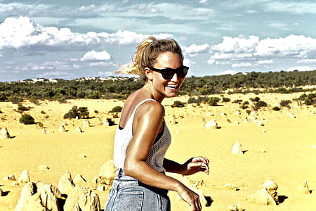 woman walking along the desert thumbnail