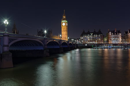 arch bridge near Elizabeth tower at nighttime thumbnail