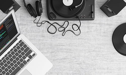 turntable near laptop computer thumbnail
