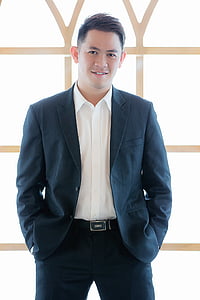 man wearing black suit jacket thumbnail