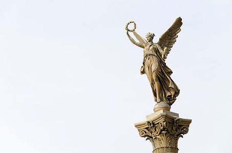 angel wearing dress statue thumbnail