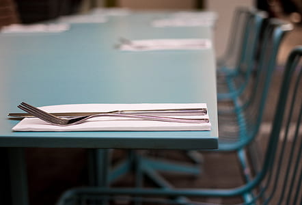 stainless steel fork on tissue paper thumbnail