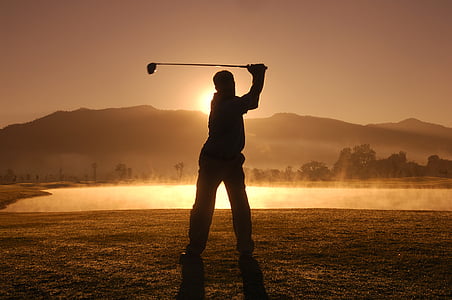 silhouette of man playing golf thumbnail