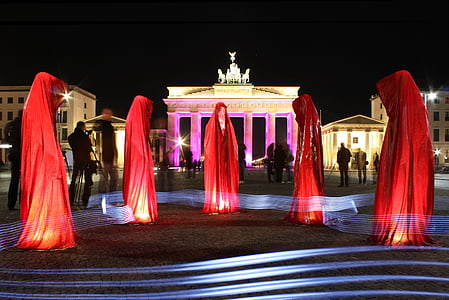 people wearing red robes during night time thumbnail